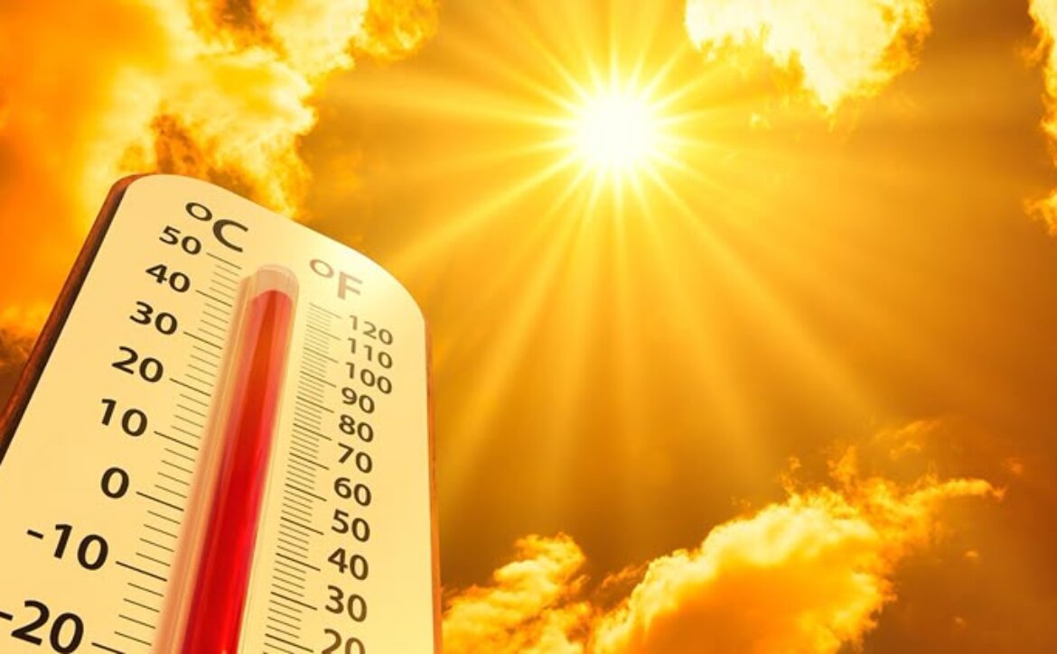 hot temperature,Thermometer on yellow sky with sun shining