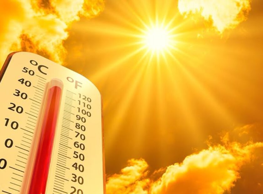 hot temperature,Thermometer on yellow sky with sun shining